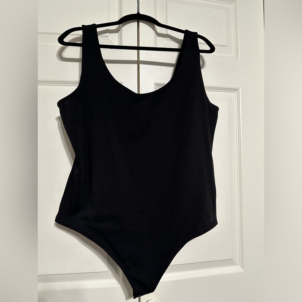 Express body contouring body suit, black, size XL, NWT